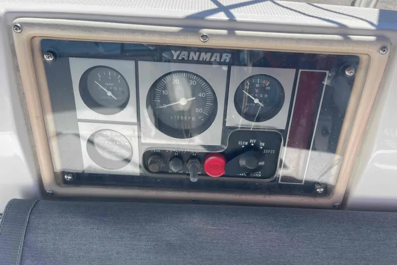 Slide: The Image of Control panel of a 2003 Hunter 426 Deck Salon sailboat with Yanmar engine gauges. - 51