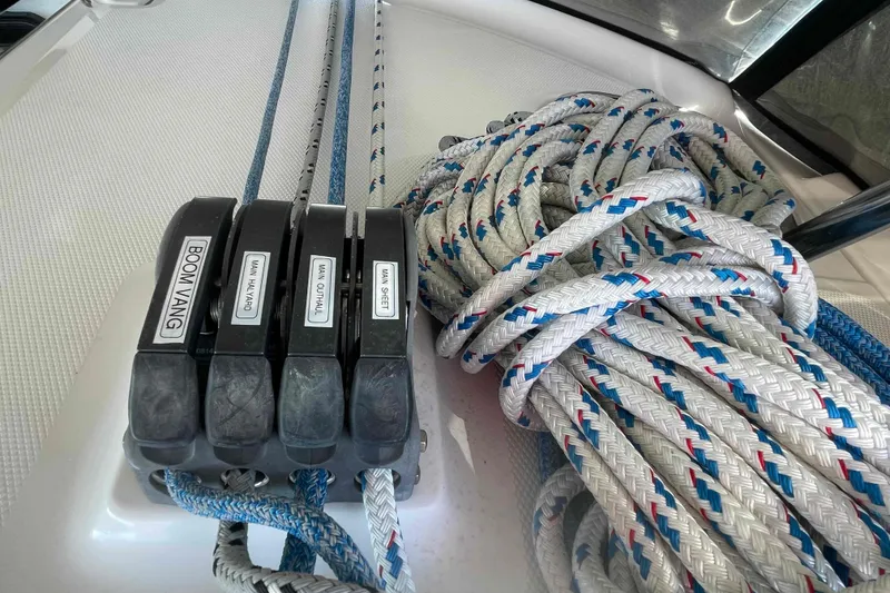 Slide: The Image of Sailing ropes and cleats on a 2003 Hunter 426 Deck Salon yacht. - 60