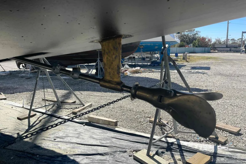 Slide: The Image of Propeller and shaft of 2003 Hunter 426 Deck Salon sailboat on dry dock. - 80