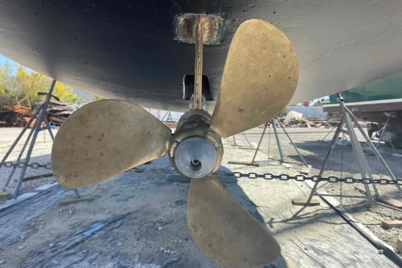 Slide: The Image of Propeller of 2003 Hunter 426 Deck Salon sailboat on dry dock. - 81