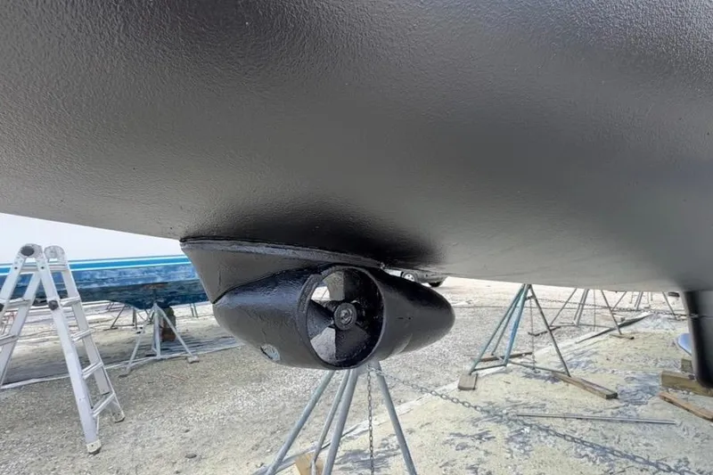 Slide: The Image of Bottom view of a 2003 Hunter 426 Deck Salon sailboat with visible propeller. - 83