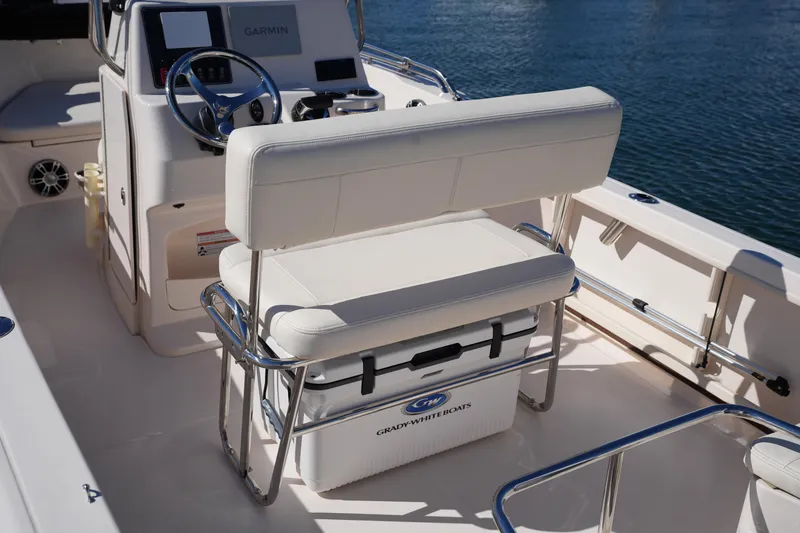 Slide: The Image of 2025 Grady-White Fisherman 180 boat interior with seating and Garmin navigation system. - 15