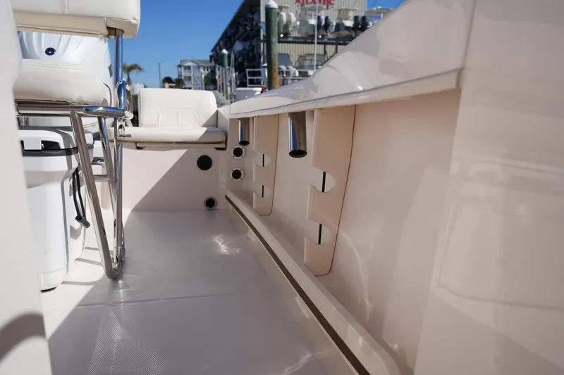 Slide: The Image of 2025 Grady-White Fisherman 180 interior, showcasing seating and storage features. - 17