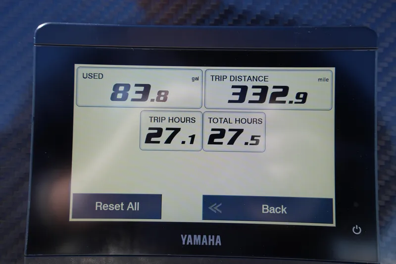 Slide: The Image of Yamaha display showing fuel usage, trip distance, and hours for Grady-White Fisherman 180, 2025 model. - 23