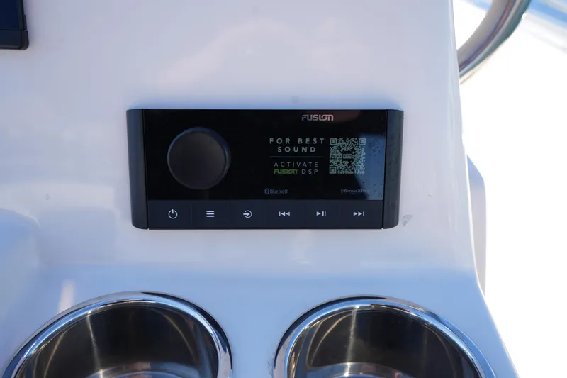 Slide: The Image of Fusion audio system on 2025 Grady-White Fisherman 180 boat dashboard. - 24