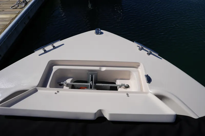 Slide: The Image of Bow of 2025 Grady-White Fisherman 180 with anchor storage at dock. - 32