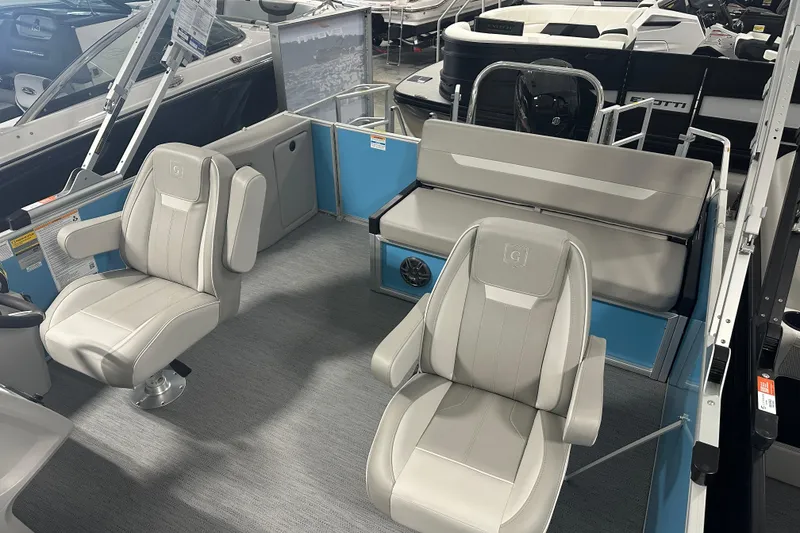 Slide: The Image of 2026 Godfrey EX 2286 SFLX boat interior with modern seating and sleek design. - 4