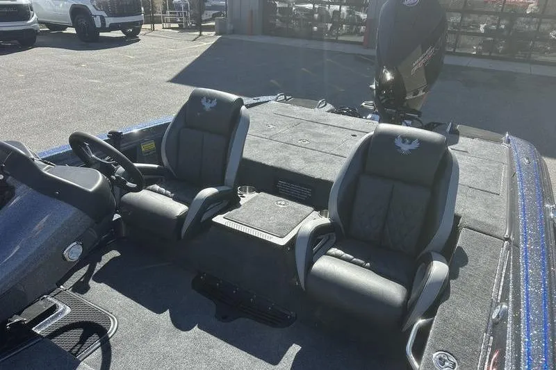 Slide: The Image of 2026 Phoenix 721 ZXL boat interior with dual seats and steering wheel. - 6