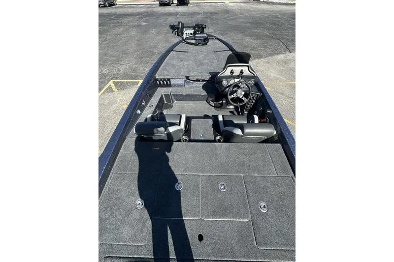 Slide: The Image of 2026 Phoenix 721 ZXL boat interior with steering wheel and seating. - 7