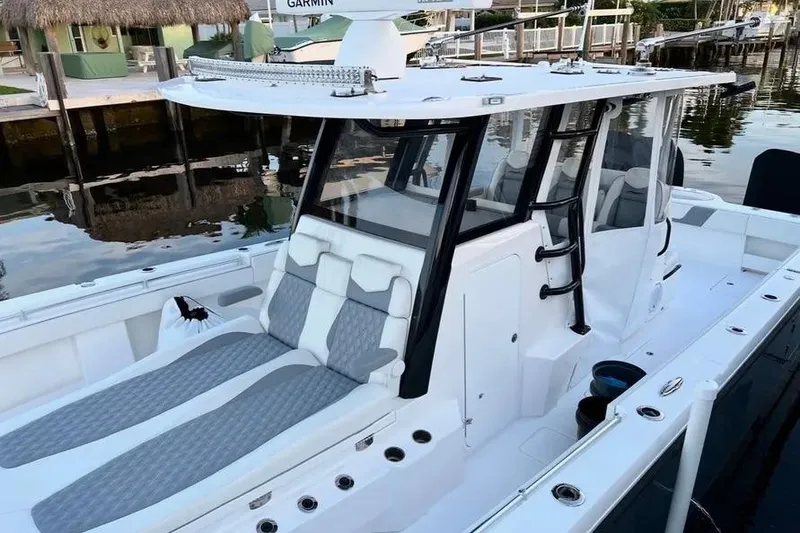 Slide: The Image of 2022 Invincible 35 Catamaran with sleek design, spacious deck, and modern amenities. - 3