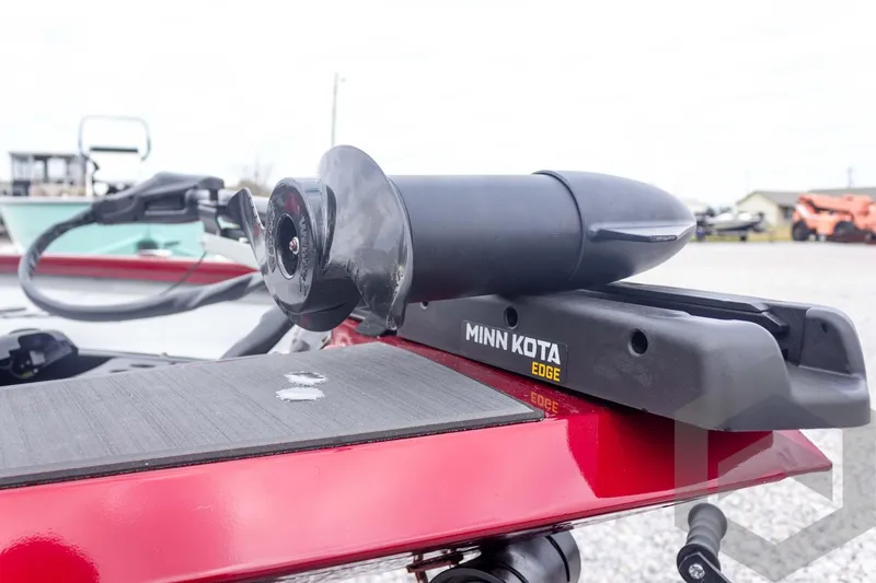 Slide: The Image of Minn Kota Edge motor on 2026 Vexus Defender 189 boat, close-up view. - 16