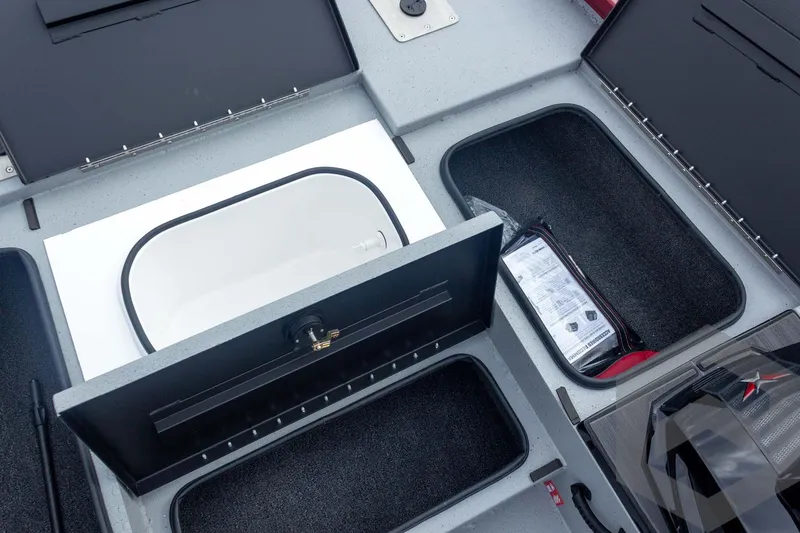 Slide: The Image of 2026 Vexus Defender 189 boat storage compartments with organized interior layout. - 25