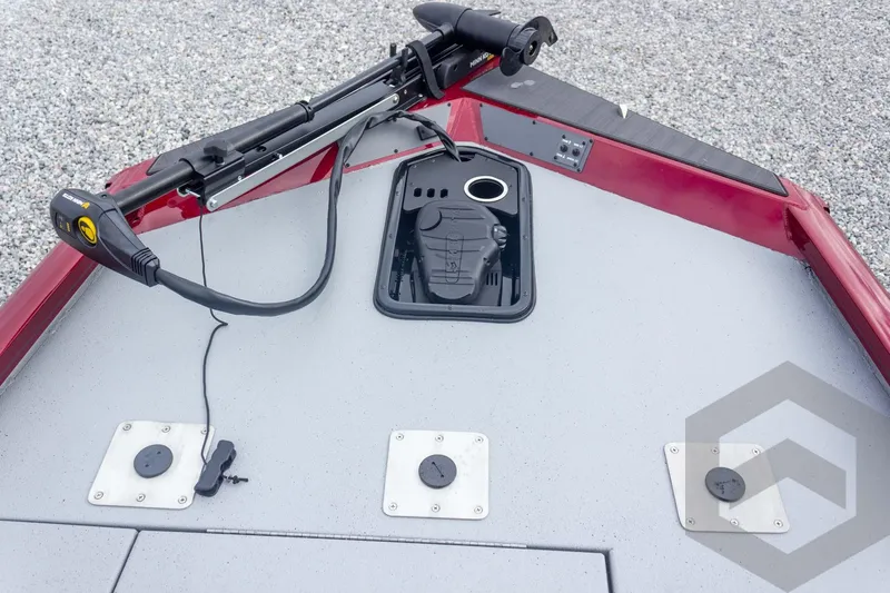 Slide: The Image of 2026 Vexus Defender 189 boat deck with trolling motor and storage hatch. - 27