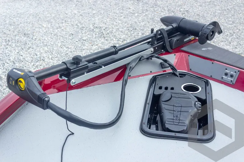 Slide: The Image of 2026 Vexus Defender 189 boat with Minn Kota trolling motor on deck. - 29