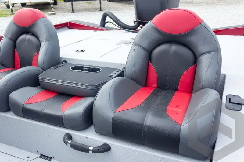 Slide: The Image of 2026 Vexus Defender 189 boat seats, black and red design, with center console. - 32