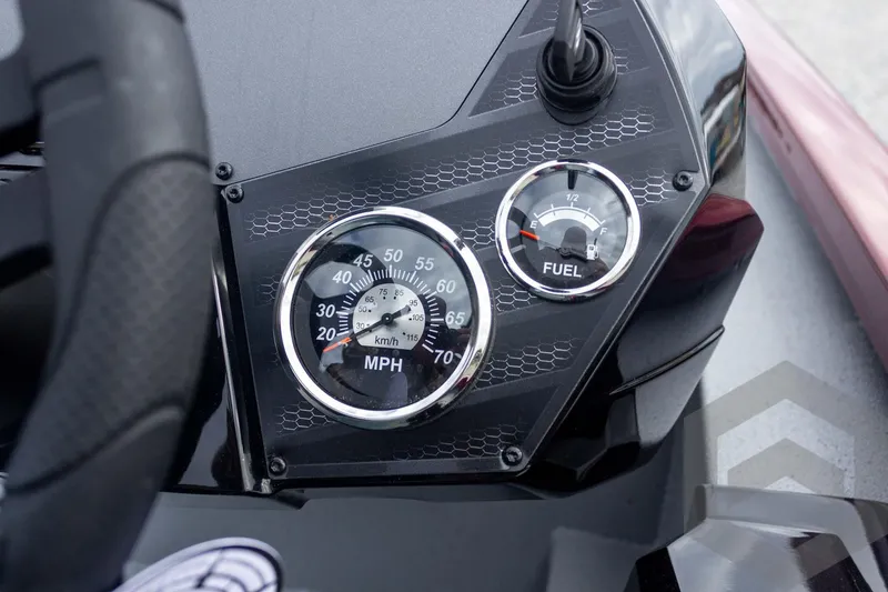 Slide: The Image of Dashboard of 2026 Vexus Defender 189 with speedometer and fuel gauge. - 38