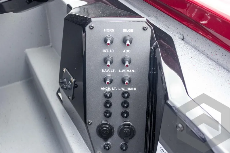 Slide: The Image of Control panel of 2026 Vexus Defender 189 boat with various switches and indicators. - 40