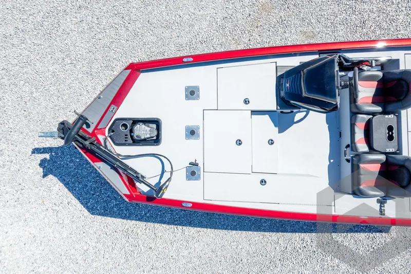 Slide: The Image of 2026 Vexus Defender 189 boat, aerial view, red and white design, spacious deck layout. - 45