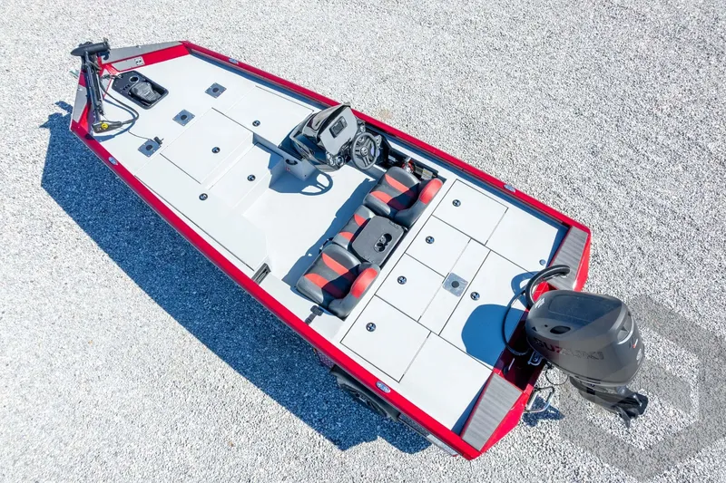 Slide: The Image of 2026 Vexus Defender 189 boat, red and gray, aerial view on gravel surface. - 49