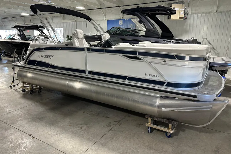 The Image of 2026 Godfrey MC 235 SBC pontoon boat by Munson Ski & Marine, elegant design. - 0