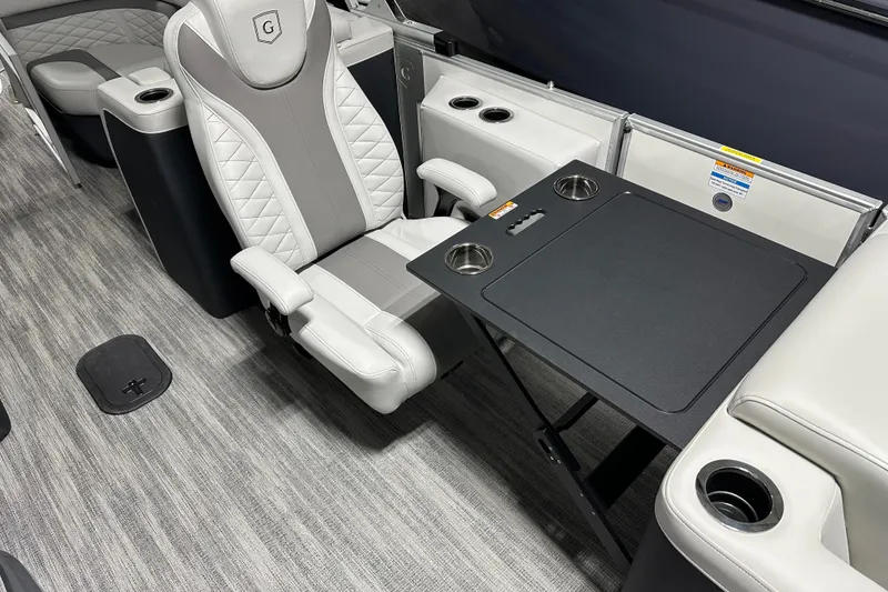 Slide: The Image of Luxurious interior of 2026 Godfrey MC 235 SBC boat with elegant seating and modern design. - 10