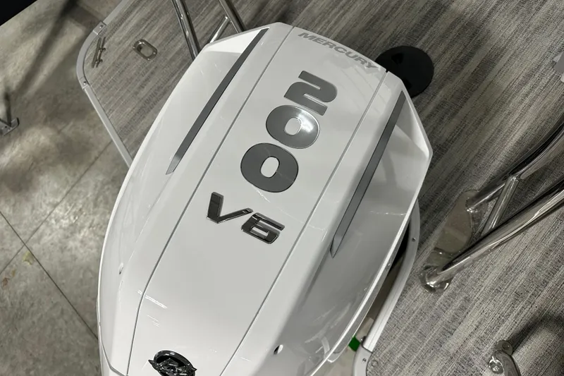 Slide: The Image of 2026 Godfrey MC 235 SBC pontoon boat in a showroom. - 3