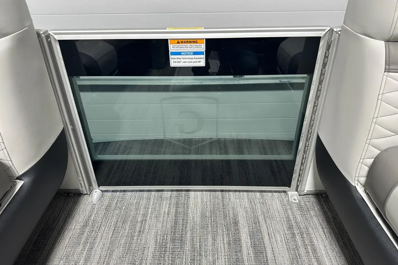 Slide: The Image of Interior of 2026 Godfrey MC 235 SBC boat with luxurious seating and modern design. - 8