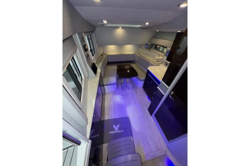 Slide: The Image of Interior of 2017 Formula 430 Super Sport Crossover with modern design and ambient lighting. - 12