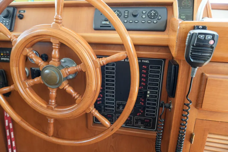 Slide: The Image of Wooden helm and control panel of 2008 Kadey-Krogen 48 North Sea yacht. - 25