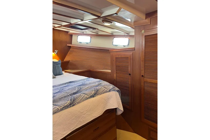 Slide: The Image of Cozy cabin interior of 2008 Krogen 48 North Sea yacht with wooden accents. - 33