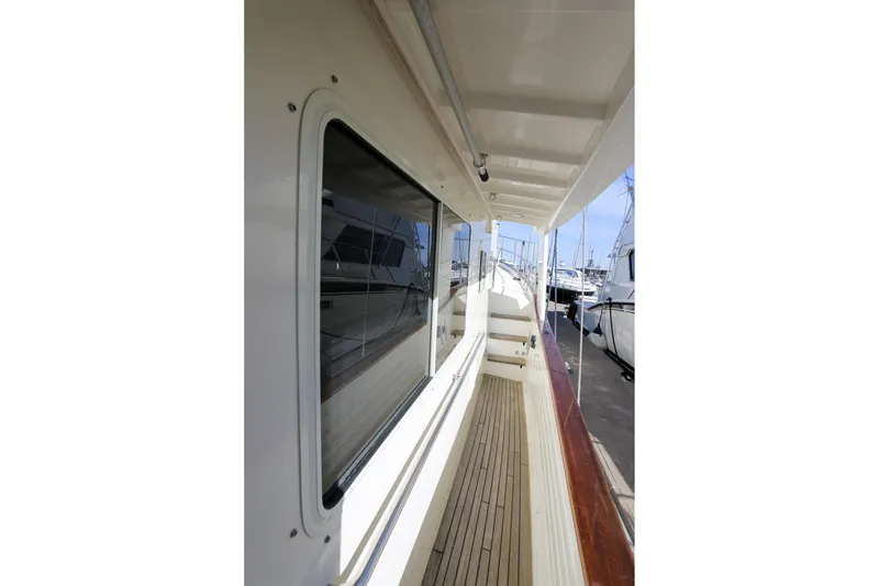 Slide: The Image of Side deck view of 2008 Kadey-Krogen 48 North Sea yacht in marina. - 43