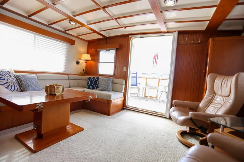 Slide: The Image of Luxurious interior of 2008 Kadey-Krogen 48 North Sea yacht with elegant seating and wooden accents. - 5