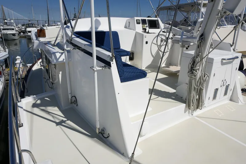 Slide: The Image of 2008 Kadey-Krogen 48 North Sea yacht deck with helm, seating, and nautical equipment. - 54