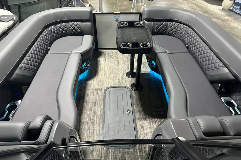 Slide: The Image of Luxurious interior of 2026 Godfrey AP 255 DFLW pontoon boat with plush seating and table. - 8