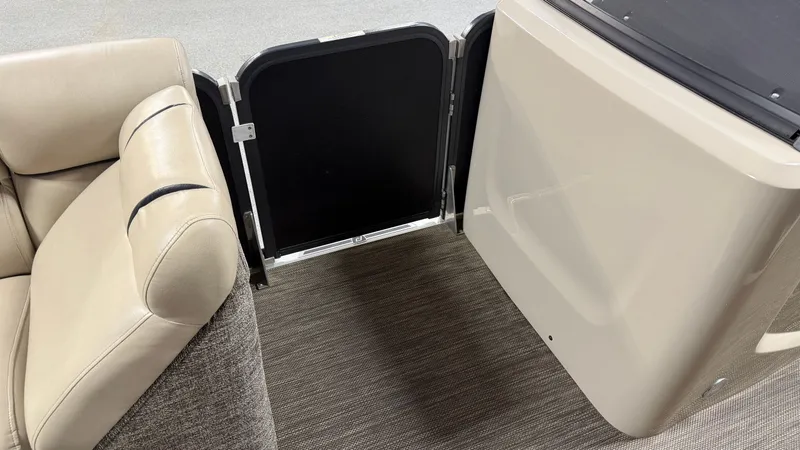 Slide: The Image of Interior of a 2017 Premier 270 S-Series with seat and door. - 33