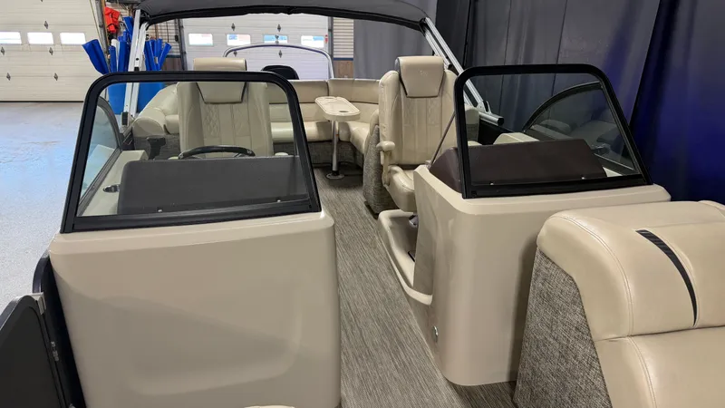 Slide: The Image of Interior of a 2017 Premier 270 S-Series boat, beige leather seating. - 34
