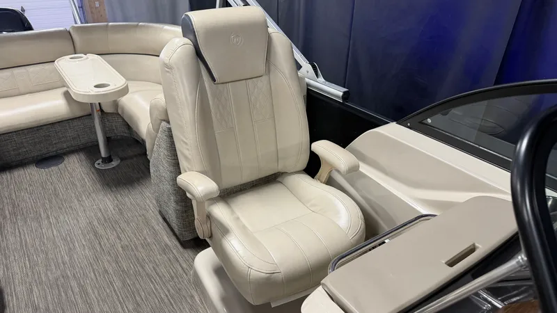 Slide: The Image of Interior of a 2017 Premier 270 S-Series boat with beige seating. - 36