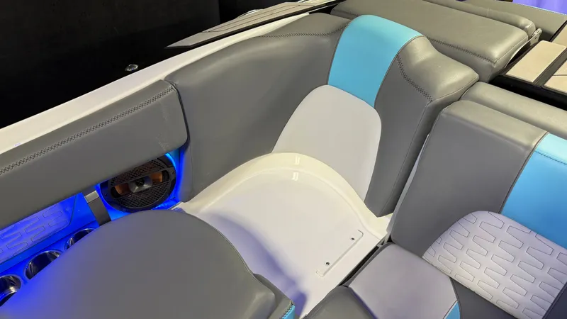 Slide: The Image of Interior of a 2019 MasterCraft X24 boat with blue lighting. - 37
