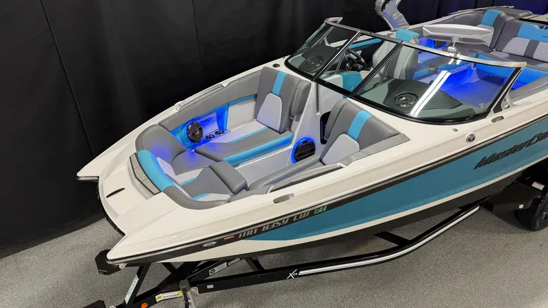Slide: The Image of 2019 MasterCraft X24 boat with blue LED lighting. - 5