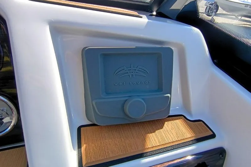 Slide: The Image of Wet Sounds audio control panel on 2026 Starcraft SVX 230 DC OB boat dashboard. - 15