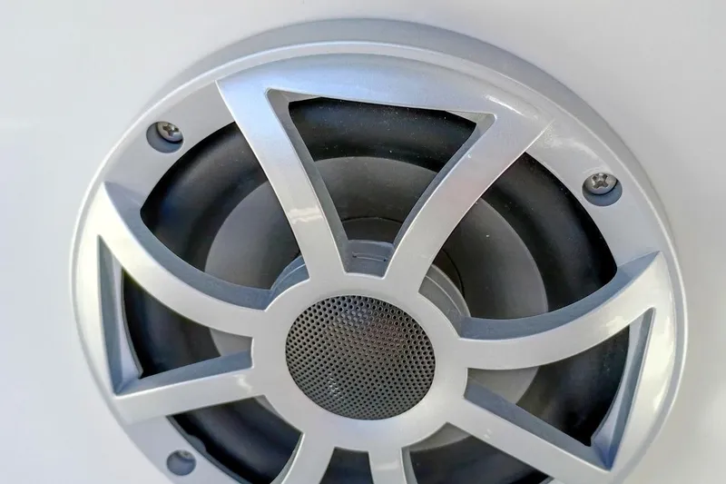 Slide: The Image of Close-up of a speaker on a 2026 Starcraft SVX 230 DC OB boat. - 37