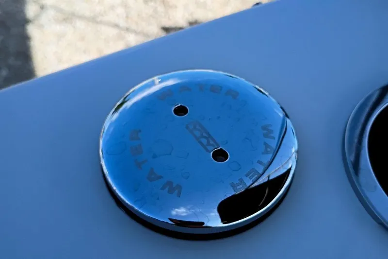 Slide: The Image of Chrome water cap on 2026 Starcraft SVX 230 DC OB boat deck. - 46