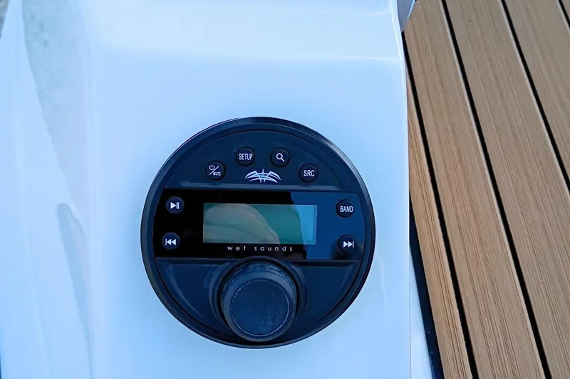 Slide: The Image of Audio control panel on 2026 Starcraft SVX 230 DC OB boat, featuring Wet Sounds system. - 47