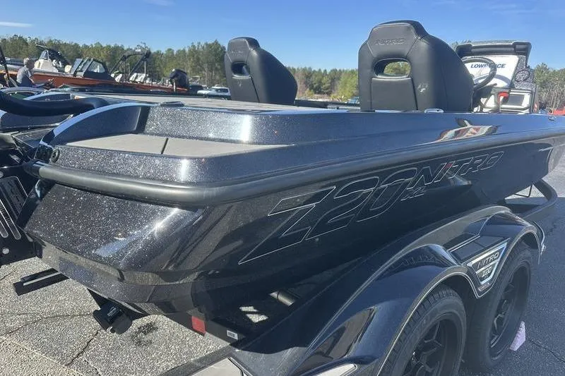 Slide: The Image of 2026 Nitro Z20 XL Pro boat, sleek design, parked outdoors on a sunny day. - 4