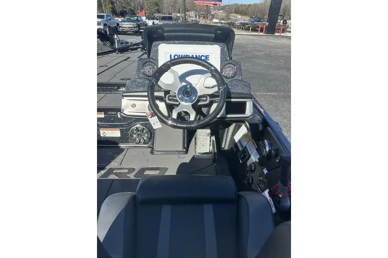 Slide: The Image of 2026 Nitro Z20 XL Pro boat dashboard with steering wheel and Lowrance display. - 8