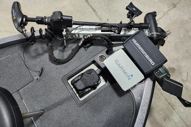 Slide: The Image of 2022 Ranger Z519 boat deck with Garmin and Humminbird electronics, trolling motor setup. - 10