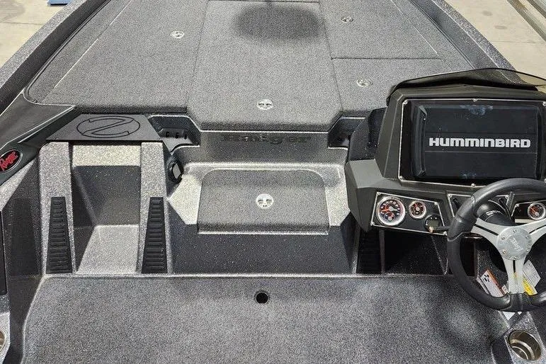 Slide: The Image of 2022 Ranger Z519 boat interior with Humminbird electronics and steering console. - 13