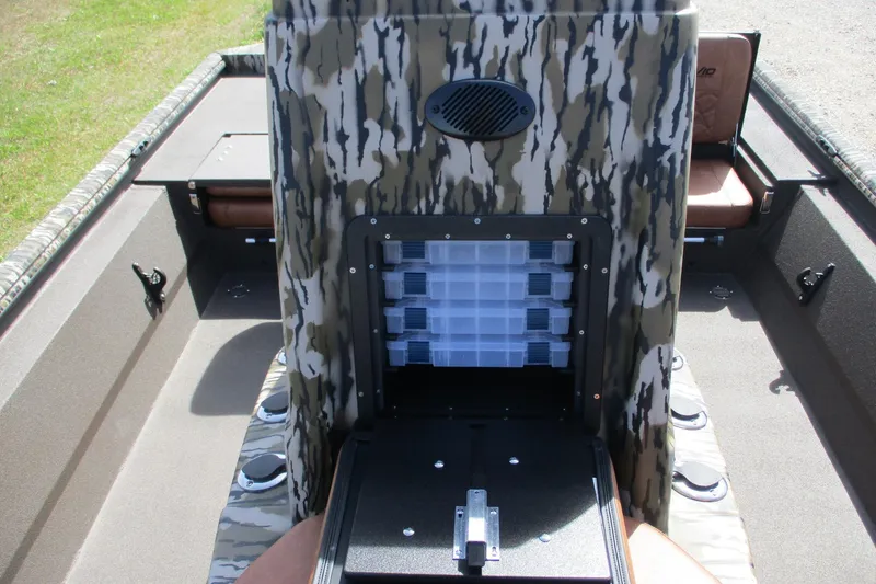 Slide: The Image of 2026 Avid 20 Rogue CC boat interior with camouflage design and storage compartments. - 12