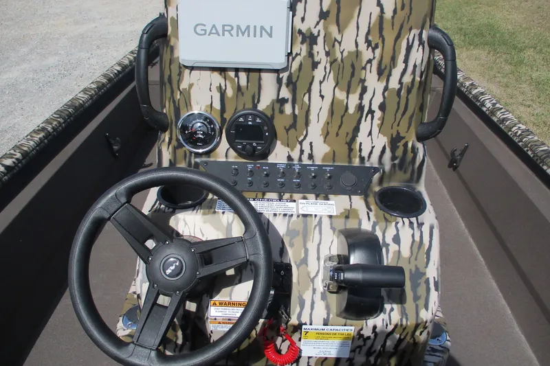 Slide: The Image of Steering console of 2026 Avid 20 Rogue CC boat with Garmin navigation system. - 18