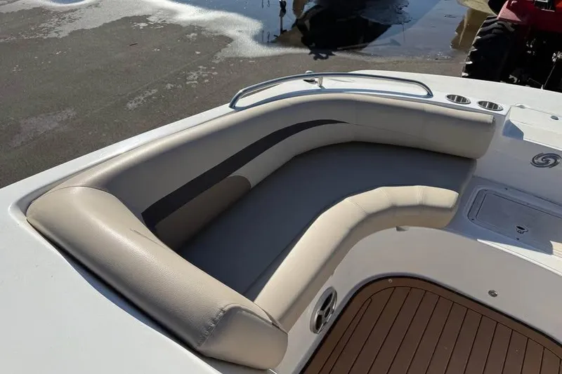 Slide: The Image of 2018 Hurricane SunDeck Sport 188 IO boat with beige seating and wood-style flooring. - 13